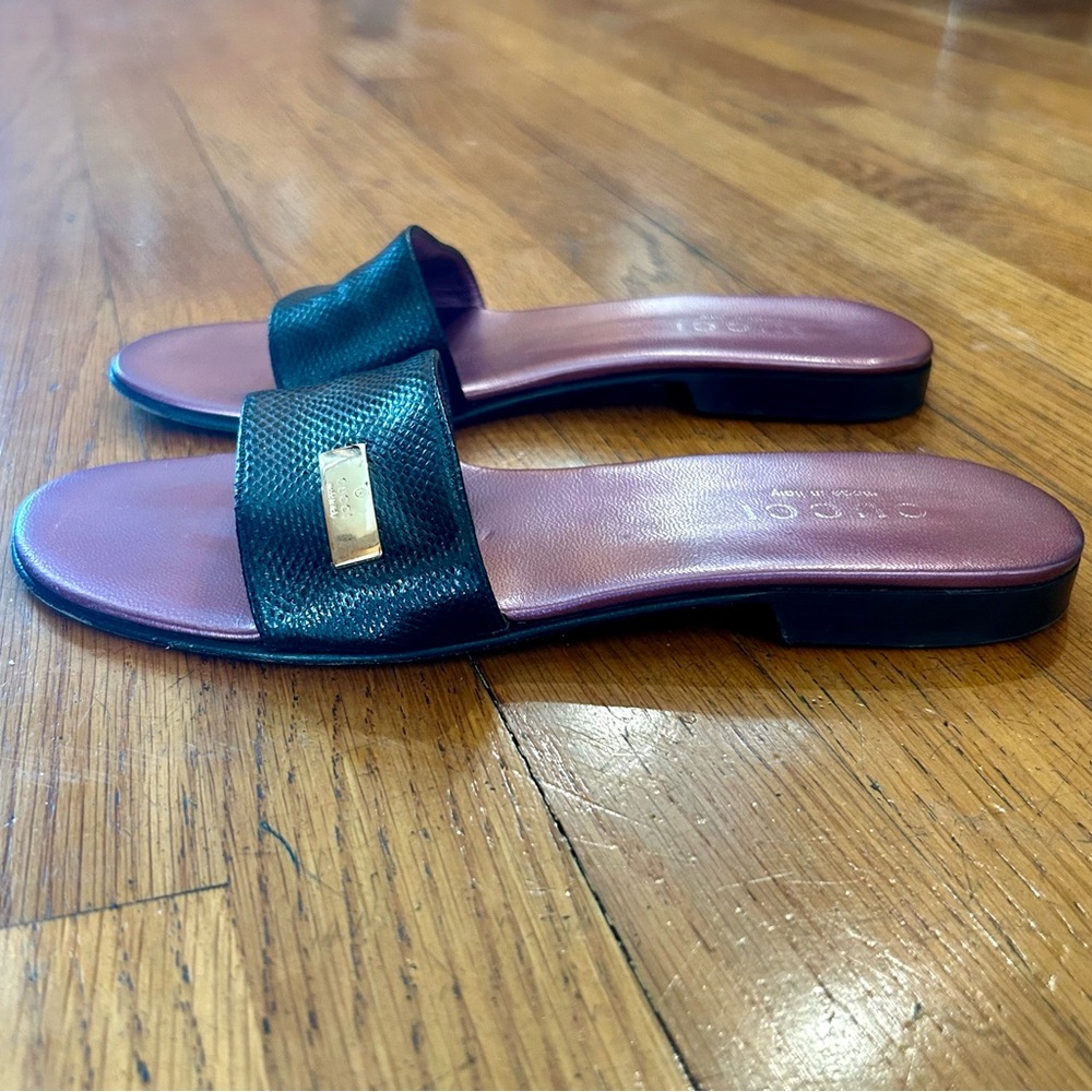 Gucci black embossed slides